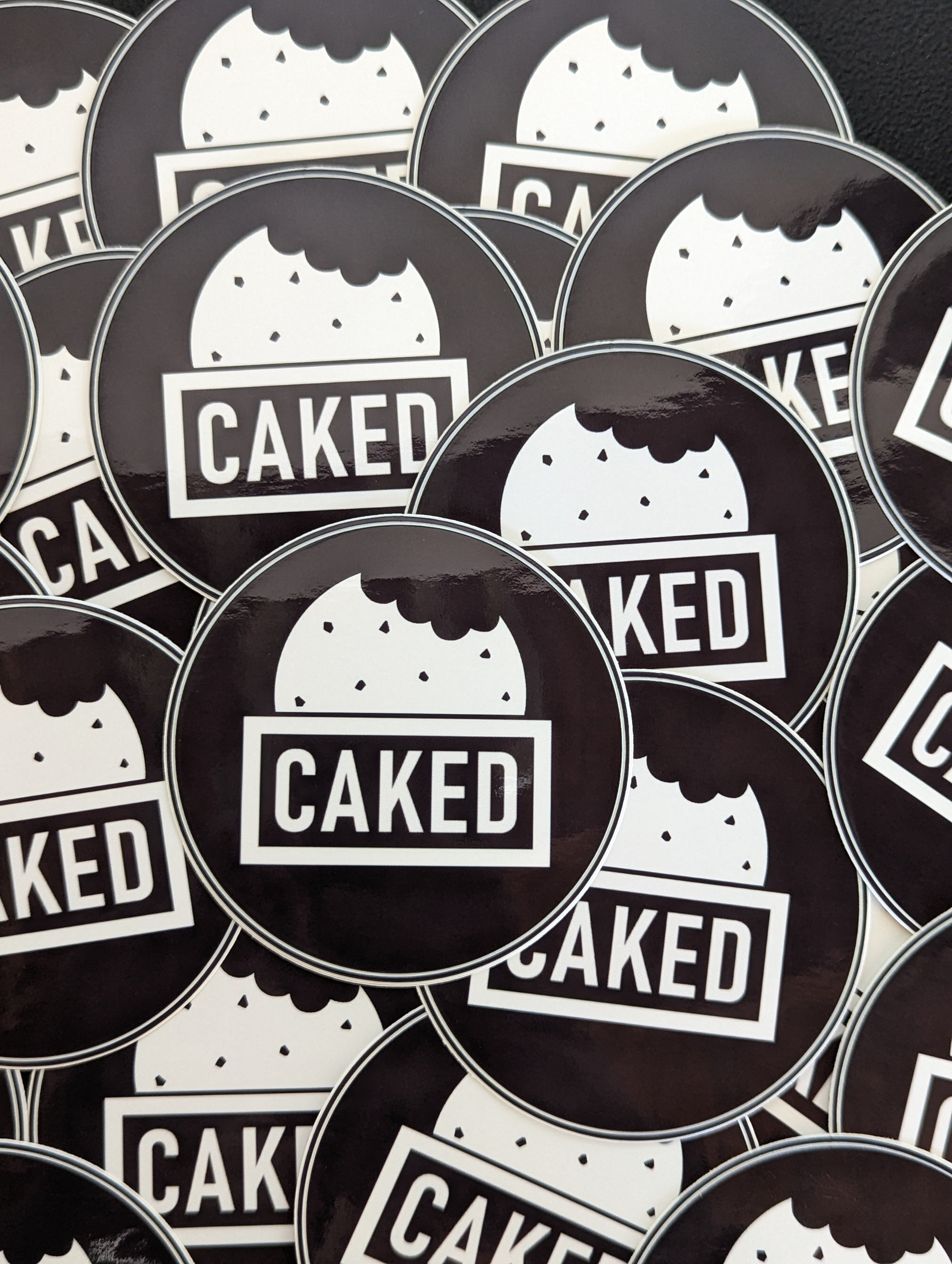 CAKED Sticker